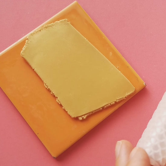 this video shows how to create skin texture with a roller on a piece of polymer clay