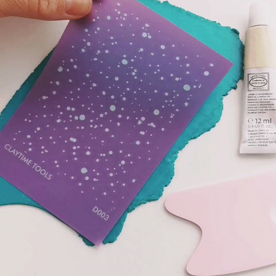 Instructional video demonstrating how to use silkscreen with acrylic paint on polymer clay