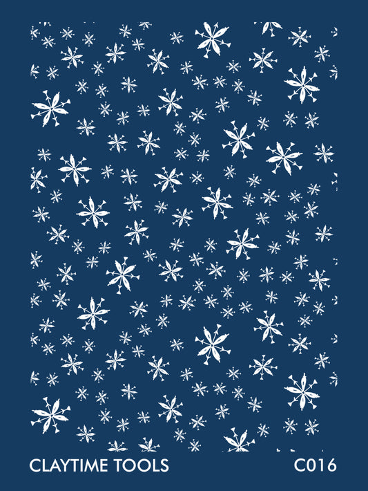 Image of a silkscreen print featuring snowflake shapes.