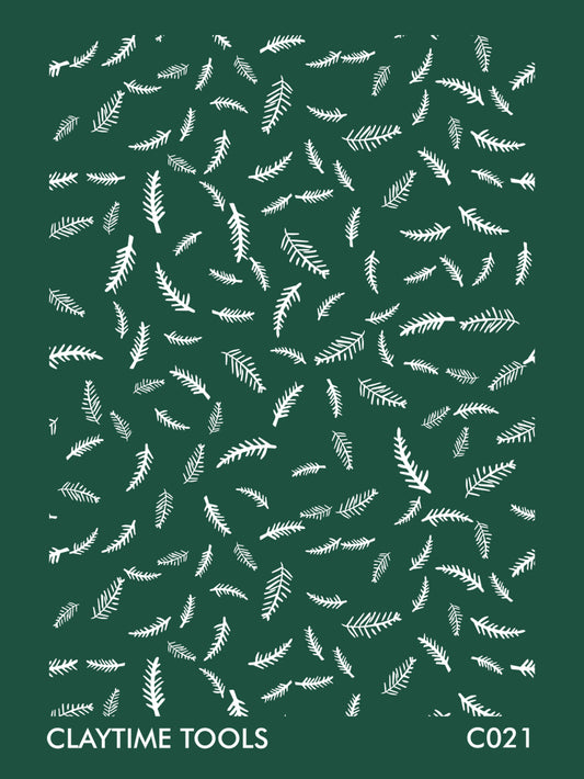 Image of a silkscreen print featuring hand-drawn sketches of Christmas tree branches.