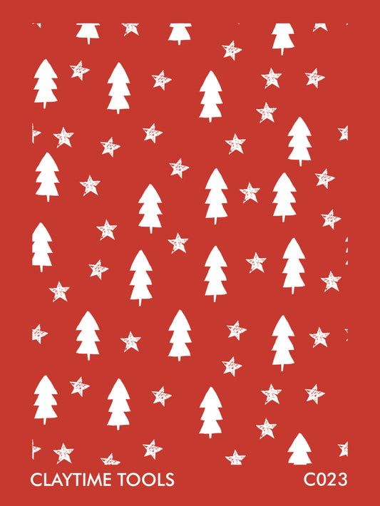 Image of a silkscreen print featuring sketches of Christmas trees and stars.