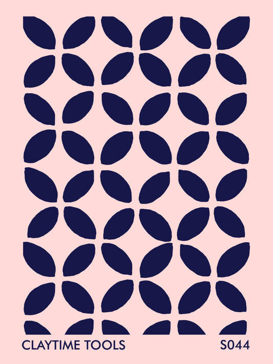 Blue ethnic tile on a light pink background.