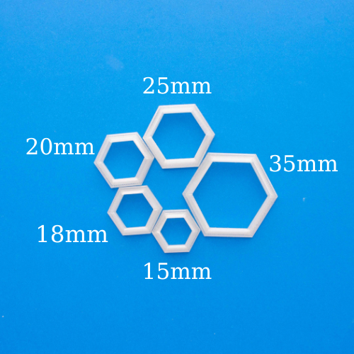 set of 5 hexagon cutters in a blue background
