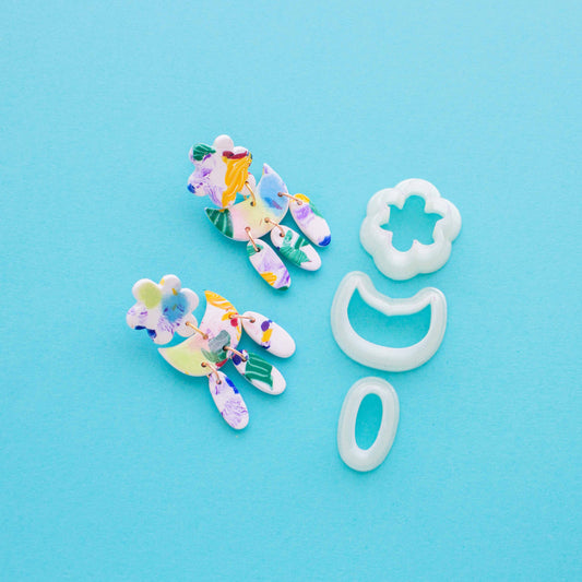 Set of three polymer clay cutters and two earrings of colorful polymer clay 