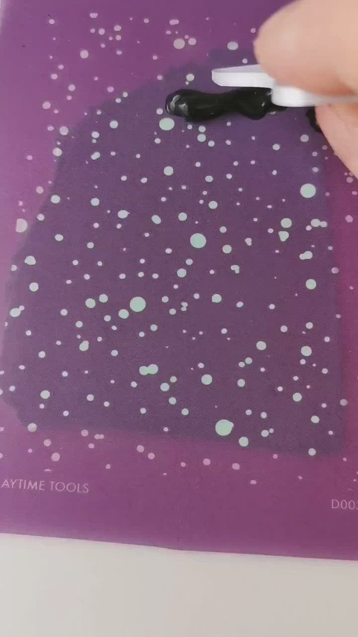Silkscreen with dots used for the polymer clay 
