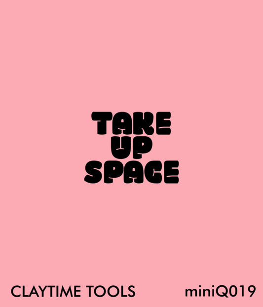 Mini silkscreen "Take up space" on a pink background.